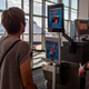 A woman heading to Copenhagen from Dulles International Airport submits to a VeriScan check in September 2018.
